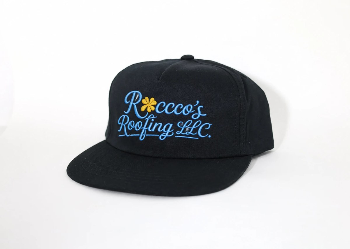 Rocco's Roofing LLC black embroidered snapback hat with blue script logo