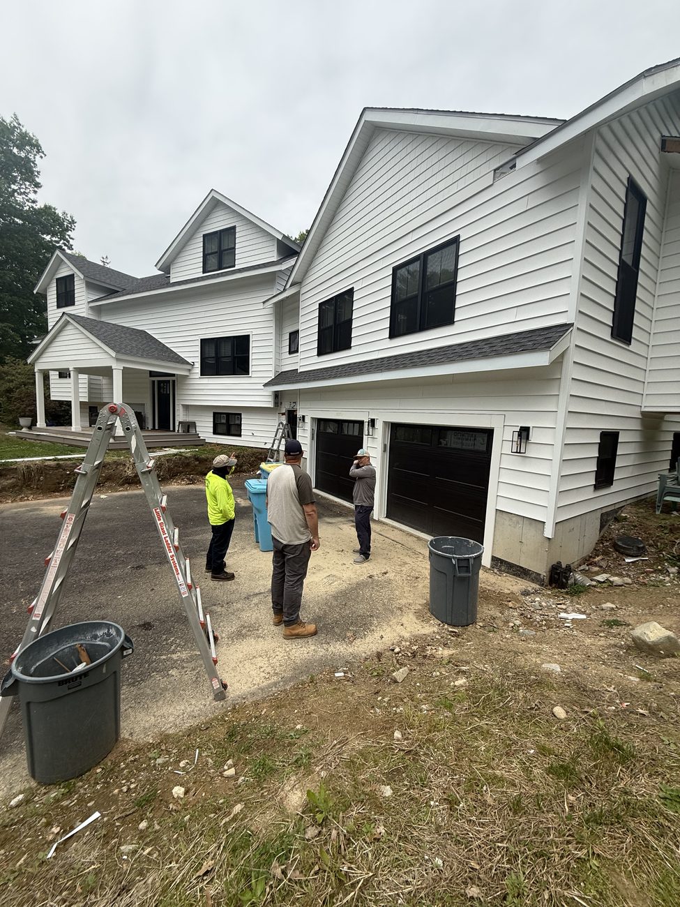 New roofing and siding on a large home in the Norfolk, MA area